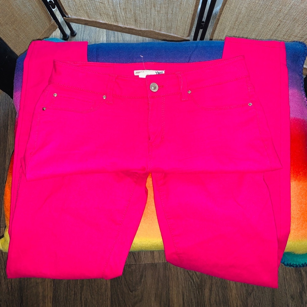 Neon pink stretchy jeans….
